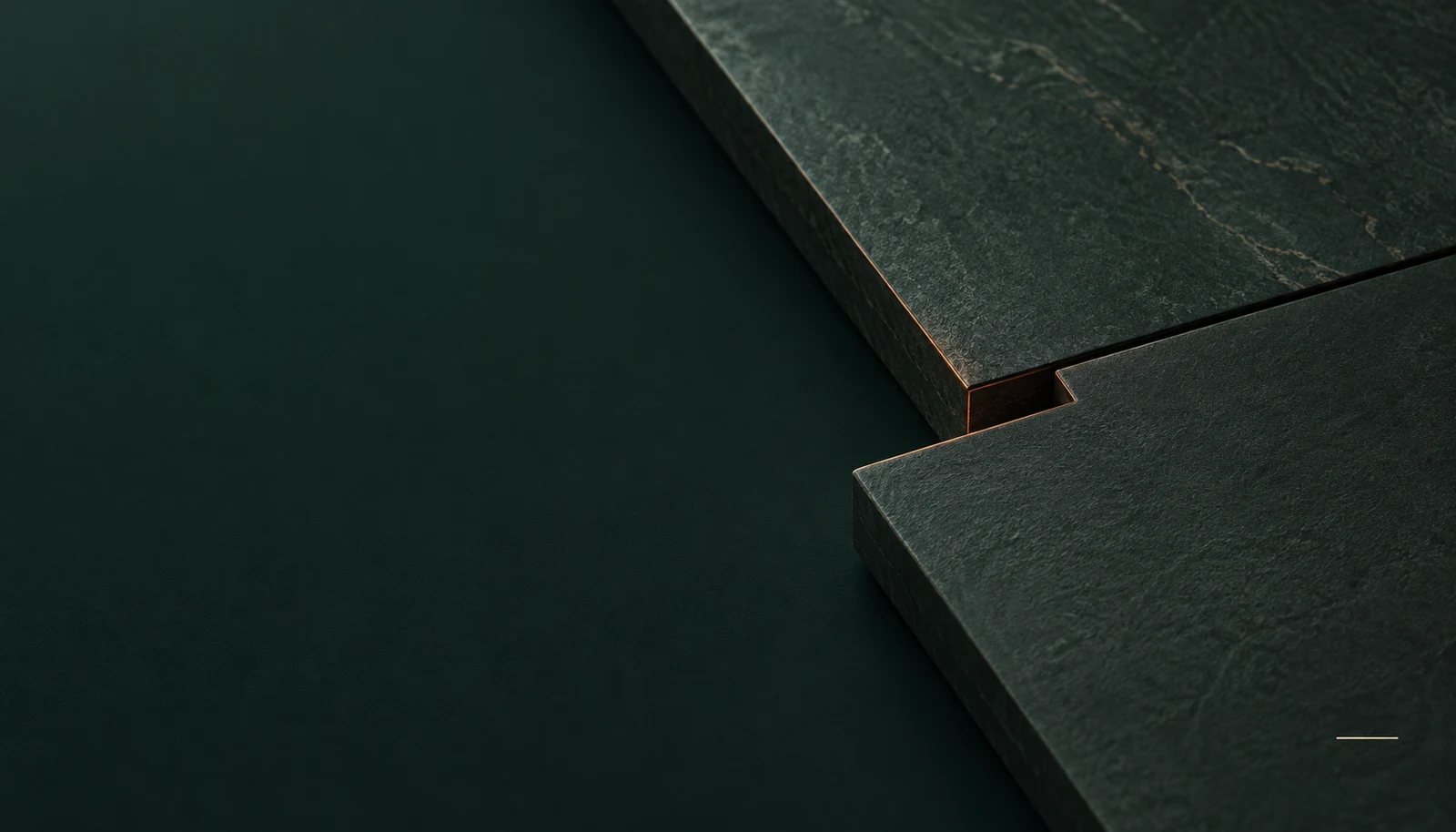 Original matte mineral planes separated by a stepped boundary