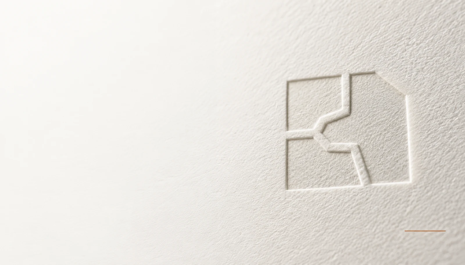 Original embossed paper study of the selected Jurisdiction Seam logo